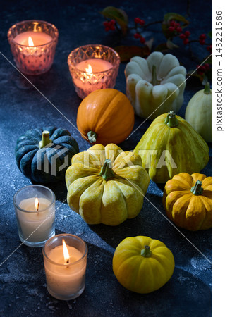 Pumpkins illuminated by moonlight - Halloween image Pumpkins illuminated by moonlight - Halloween image 143221586