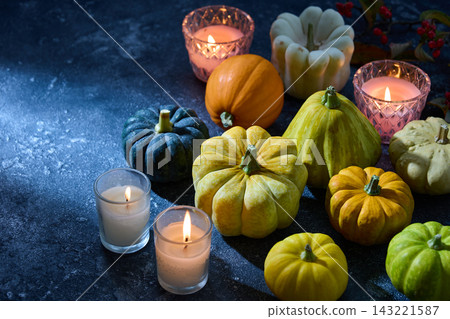 Pumpkins illuminated by moonlight - Halloween image Pumpkins illuminated by moonlight - Halloween image 143221587