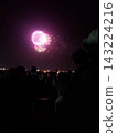 Fireworks blooming in the summer night sky 143224216