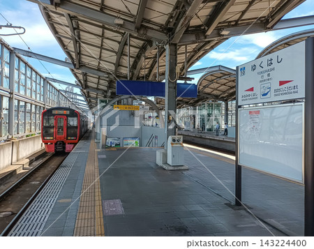 JR Kyushu Yukuhashi Station platform and train in Yukuhashi City, Fukuoka Prefecture JR Kyushu Yukuhashi Station platform and train in Yukuhashi City, Fukuoka Prefecture 143224400
