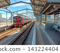 JR Kyushu Yukuhashi Station platform and train in Yukuhashi City, Fukuoka Prefecture 143224404