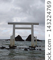A large torii gate and Meotoiwa (Married Couple Rocks) floating in the sea (Sakurai Futamigaura) 143224769