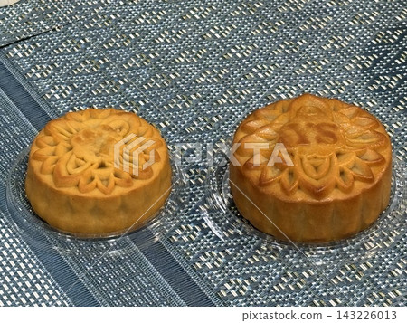 Two Traditional Mooncakes with Decorative Pattern Two Traditional Mooncakes with Decorative Pattern 143226013