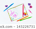 Notebook with stationery on a white table 143226731