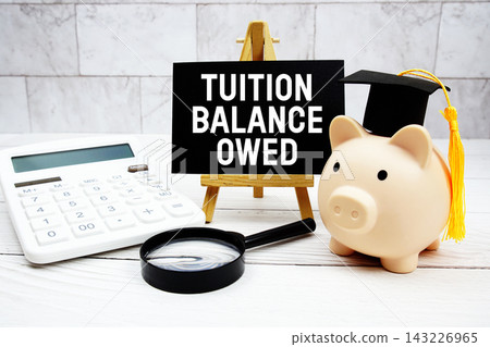 Tuition Balance Owed text with mortarboard, piggy bank, calculator, magnifying glass Tuition Balance Owed text with mortarboard, piggy bank, calculator, magnifying glass 143226965