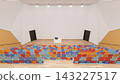 3D render of an empty modern auditorium featuring colorful seats, a wooden floor, and a white stage with a podium. 143227517