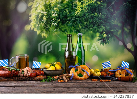 Oktoberfest food: beer, pretzel, sausages, stewed cabbage, potato Oktoberfest food: beer, pretzel, sausages, stewed cabbage, potato 143227837