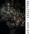 festive fireworks in the night sky outside the city 143227986