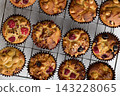 Assorted Homemade Muffins with Berries Nuts and Chocolate 143228065