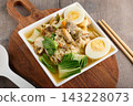 Asian Chicken Noodle Soup with Egg and Vegetables 143228073