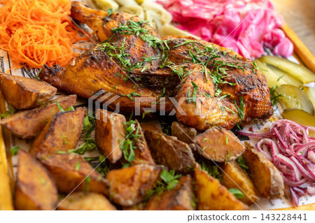 Juicy grilled kebab sprinkled with fresh parsley Juicy grilled kebab sprinkled with fresh parsley 143228441