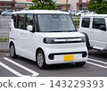 Imported car image: BYD Racco parked in a parking lot. 143229393