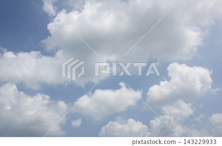 It is a blue sky with white clouds. 143229933