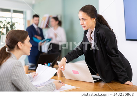 group of employees working in an office group of employees working in an office 143230968