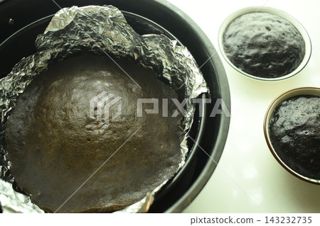 brown chocolate cake bake on aluminum foil paper brown chocolate cake bake on aluminum foil paper 143232735