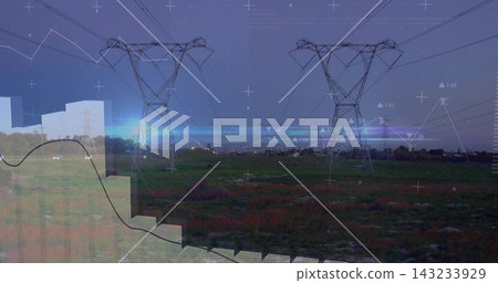 Showing two lattice towers with power lines in grassy corridor at dusk with town lights, overlays Showing two lattice towers with power lines in grassy corridor at dusk with town lights, overlays 143233929