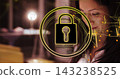 Glowing neon padlock floating over laptop on desk with circuit overlays and woman in white blouse 143238525