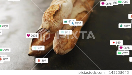 Alerts are popping as notification bubbles over 3 crusty baguettes on slate table, showing buzz Alerts are popping as notification bubbles over 3 crusty baguettes on slate table, showing buzz 143238643