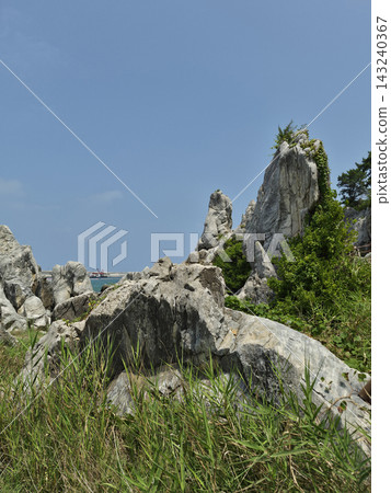 It is a landscape featuring strangely shaped rocks. 143240367