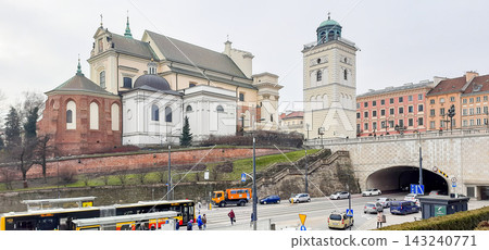 St. Anne's Church and tower in Warsaw with traffic on the street below - Warsaw, Poland - January 26, 2023 St. Anne's Church and tower in Warsaw with traffic on the street below - Warsaw, Poland - January 26, 2023 143240771
