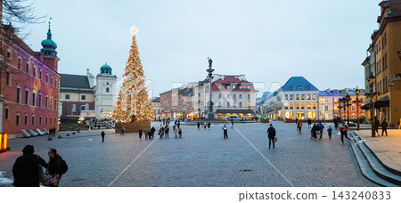 Large illuminated Christmas tree in a historic European city square during dusk - Warsaw, Poland - January 26, 2023 Large illuminated Christmas tree in a historic European city square during dusk - Warsaw, Poland - January 26, 2023 143240833
