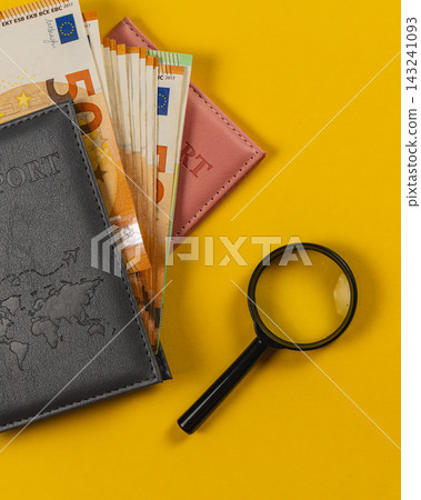Planning travel budget with passport and euro cash on table Planning travel budget with passport and euro cash on table 143241093