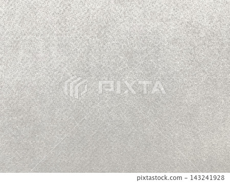 Horizontal background image of a rough, white-gray felt fiber surface. Horizontal background image of a rough, white-gray felt fiber surface. 143241928