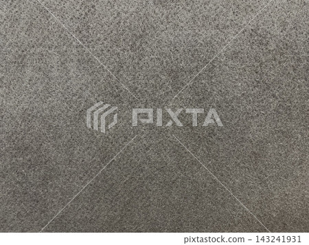 Horizontal background image of a dark gray, rough felt fiber surface. Horizontal background image of a dark gray, rough felt fiber surface. 143241931