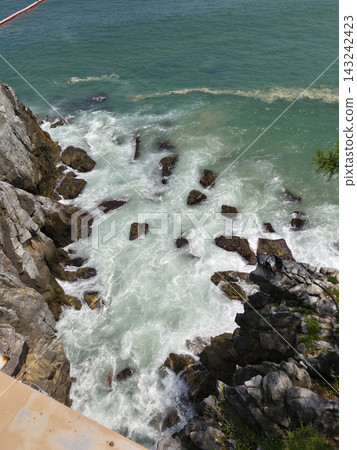 It is a seaside with waves. It is a seaside with waves. 143242423