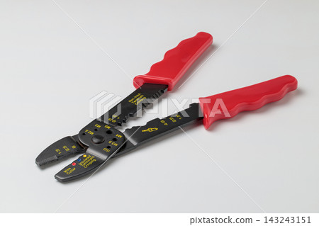 Electrician's pliers with red grips placed against a white background Electrician's pliers with red grips placed against a white background 143243151