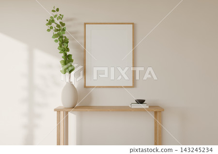 Vertical oak frame mockup above an oak console table on a warm beige plaster wall Vertical oak frame mockup above an oak console table on a warm beige plaster wall 143245234