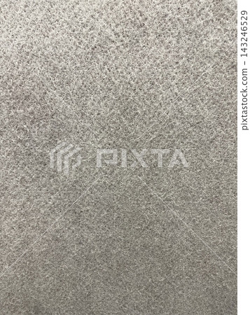 A vertical background image of a gray, coarse felt fiber surface. A vertical background image of a gray, coarse felt fiber surface. 143246529