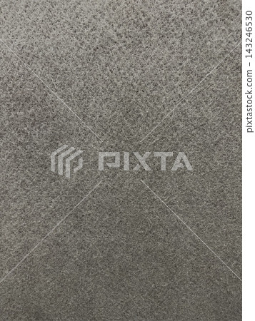 A vertical background image of a dark gray, coarse felt fiber surface. A vertical background image of a dark gray, coarse felt fiber surface. 143246530
