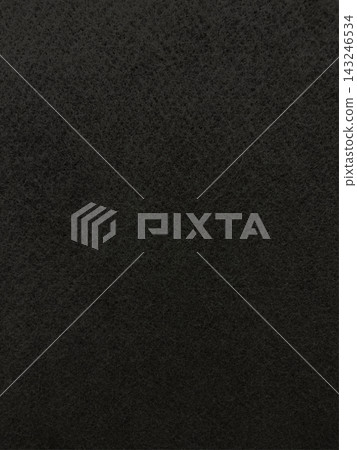 A vertical background image of a charcoal-colored, coarse felt fiber material surface. A vertical background image of a charcoal-colored, coarse felt fiber material surface. 143246534