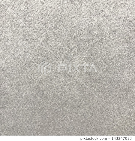 Square background image of a light gray, rough felt fiber surface. Square background image of a light gray, rough felt fiber surface. 143247053