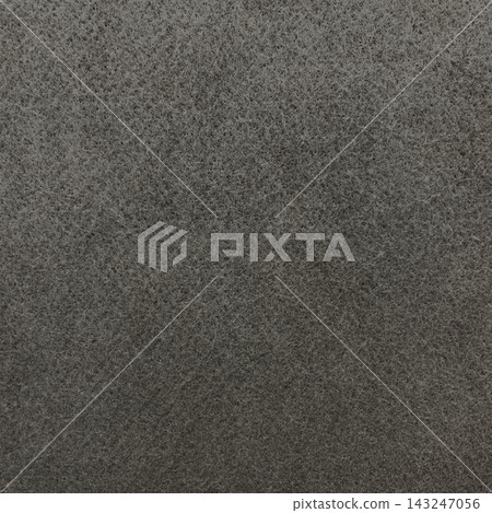 Square background image of a light black-gray rough felt fiber surface. Square background image of a light black-gray rough felt fiber surface. 143247056