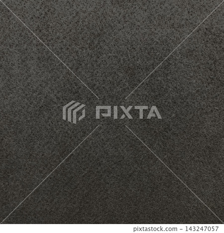 Square background image of a blackish-gray, coarse felt fiber surface. Square background image of a blackish-gray, coarse felt fiber surface. 143247057