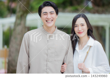 young couple taking a walk young couple taking a walk 143249960