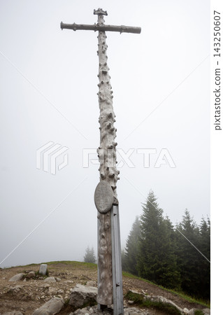 Summit cross Hinteres Hornle mountain in Bavaria, Germany Summit cross Hinteres Hornle mountain in Bavaria, Germany 143250607