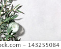 Eucalyptus Leaves and Scented Candle on Minimal Light Background 143255084