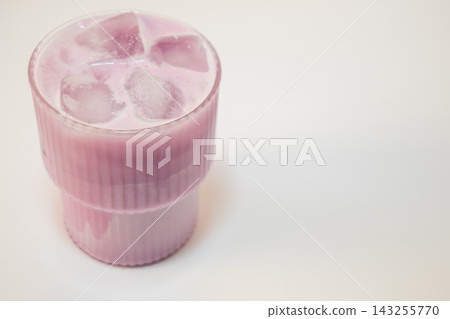 Pink Iced Matcha in Clear Glass on Light Background Pink Iced Matcha in Clear Glass on Light Background 143255770