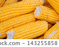 Ripe yellow corn cobs with tightly packed kernels in macro view. Detailed texture suits agriculture and seasonal food imagery 143255858