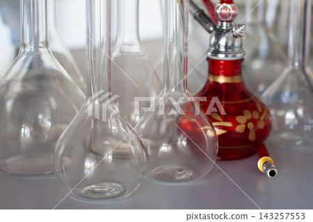 composition of red hookah and chemical glass flasks composition of red hookah and chemical glass flasks 143257553