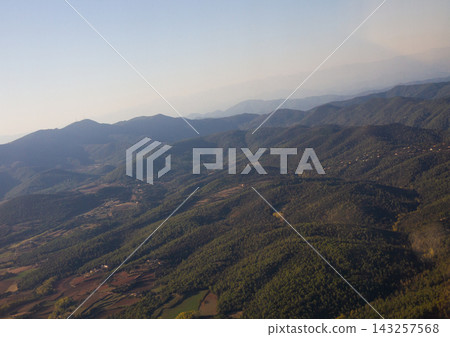 beautiful mountain landscape on high rocks from the height of the flight of the plane 143257568