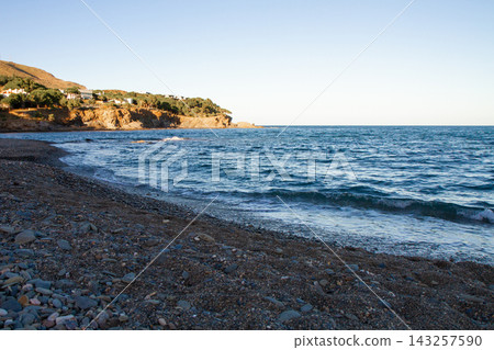 beautiful landscape of a sandy beach on the sea beautiful landscape of a sandy beach on the sea 143257590