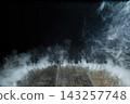 Smoke rising from wooden floor on black background 143257748