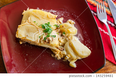 Macedonian moussaka with meat and potatoes Macedonian moussaka with meat and potatoes 143259481