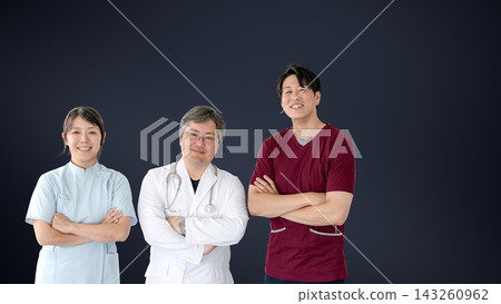 Medical professionals, including doctors and nurses, are shown smiling and with their arms crossed against a navy blue background. Medical professionals, including doctors and nurses, are shown smiling and with their arms crossed against a navy blue background. 143260962
