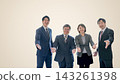 Four office workers, two men and two women, extend their hands in a welcoming gesture; smiling; beige background; margin on the left. 143261398