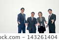 Four businessmen, two men and two women, extend their hands against a white background, smiling. There is a blank space on the left. 143261404
